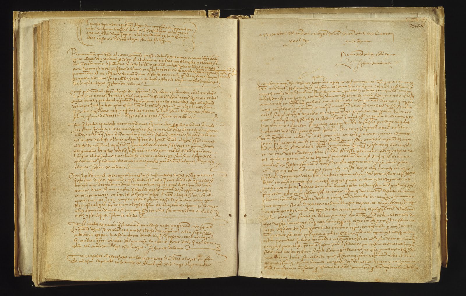 Open manuscript register containing the Capitulations of Santa Fe